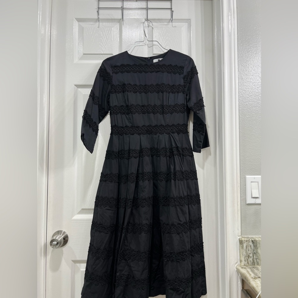 Dainty Jewell’s Black Dress